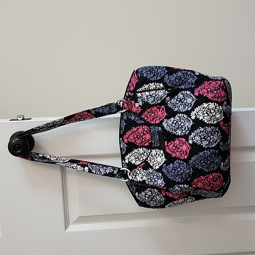 Vera Bradley purse with matching wallet.